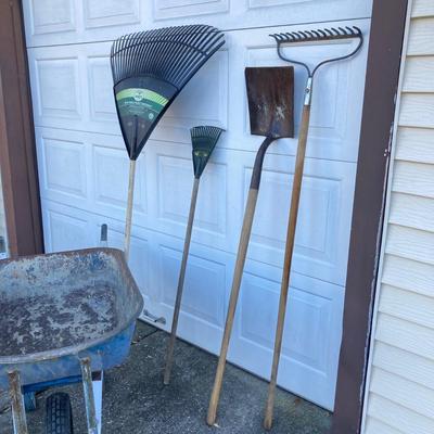 LOT 120: Jackson Metal Wheel Barrow with Rakes and Shovel