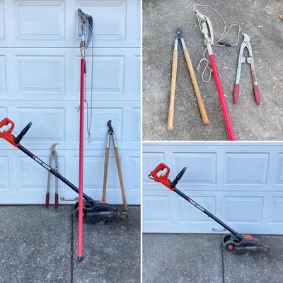LOT 124: Black & Decker Edger LE750 with Extended Pole Saw and Fiskars