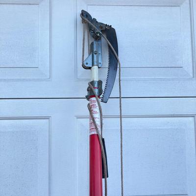 LOT 124: Black & Decker Edger LE750 with Extended Pole Saw and Fiskars