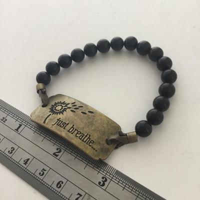 Black beaded just breathe fashion bracelet