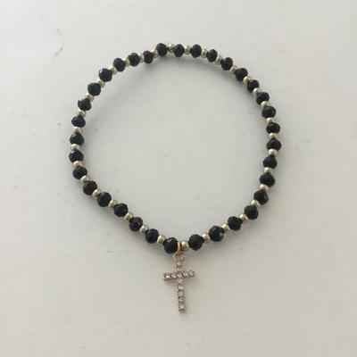 Gold tone cross stretchy bracelet