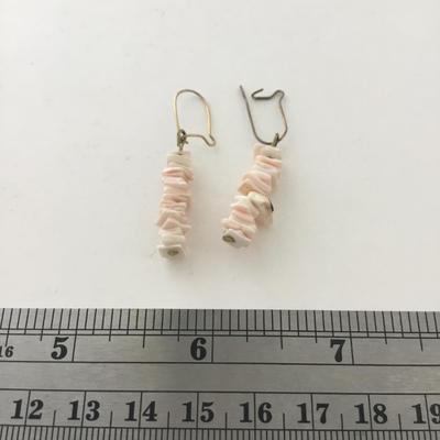 Light pink shell type bracelet with matching earrings