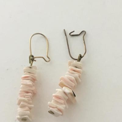 Light pink shell type bracelet with matching earrings