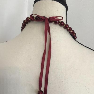 Mauve colored beaded ribbon tie necklace
