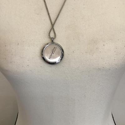 Very nice silver necklace with a charm pendant