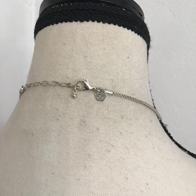 Very nice silver necklace with a charm pendant