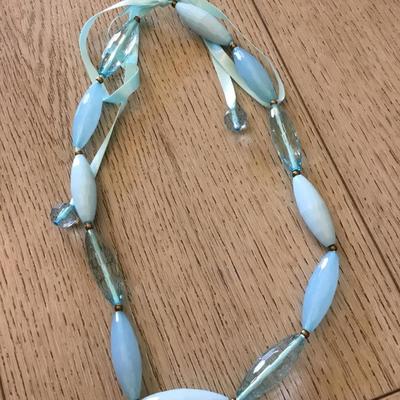 Cute light baby blue long tube, faceted bead, necklace, silver silver ribbon tie