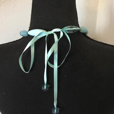 Cute light baby blue long tube, faceted bead, necklace, silver silver ribbon tie