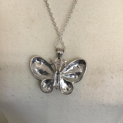 Silvertone necklace and butterfly with multicolored rhinestones