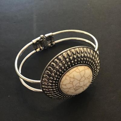 Silver tone gemstone hinged bracelet