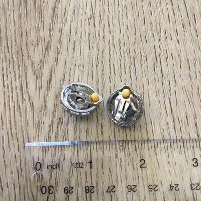 Cute Silver tone , purple, iridescent, rhinestone circular clip on earrings