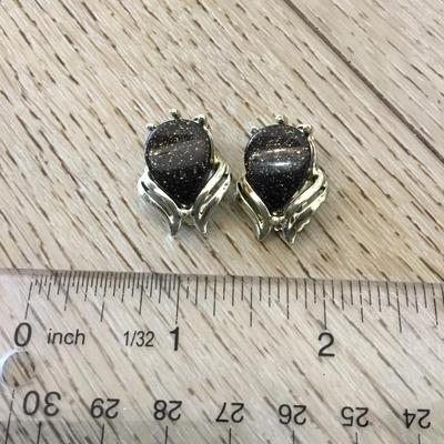 Vintage gold tone, Lucite thermal set clip on earrings. Excellent condition.