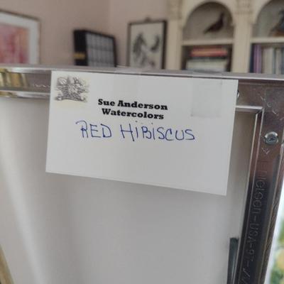 Sale Photo Thumbnail #1354: 'Red Hibiscus' Original Framed Watercolor by Nationally Recognized Artist Susan Anderson (#15).  Item is framed under plexiglass.