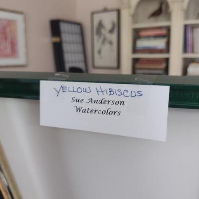 Sale Photo Thumbnail #1369: 'Yellow Hibiscus' Original Framed Watercolor by Nationally Recognized Artist Susan Anderson (#18).  Item is framed under plexiglass.