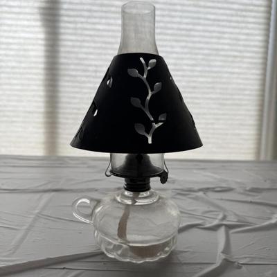 Sale Photo Thumbnail #28: with a punched tin shade featuring a floral or leaf design