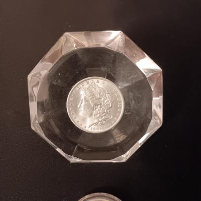 .999 SILVER AMERICAN WILDLIFE COIN AND 1885 MORGAN SILVER DOLLAR ENCASED IN A PLASTIC DIAMOND SHAPE