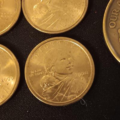 4 SACAGAWEA DOLLARS AND A MEDALLION