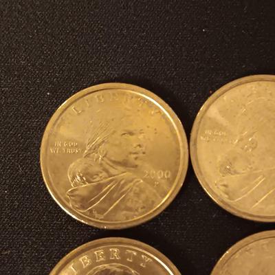 4 SACAGAWEA DOLLARS AND A MEDALLION