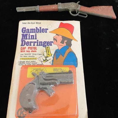 UNOPENED MINI DERRINGER AND SMALL RIFLE