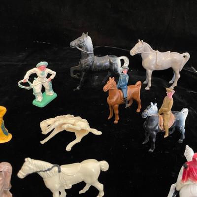 A COLLECTION OF TOY HORSES AND FIGURES