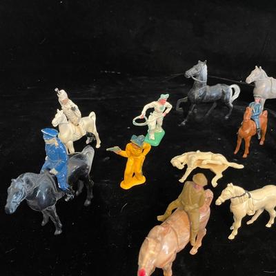 A COLLECTION OF TOY HORSES AND FIGURES