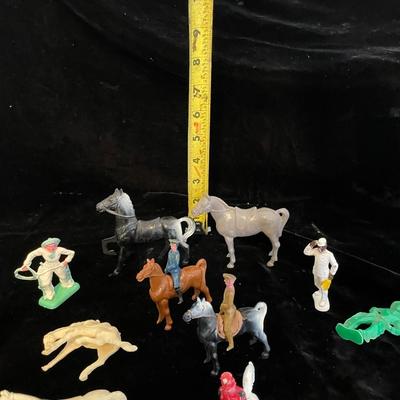 A COLLECTION OF TOY HORSES AND FIGURES