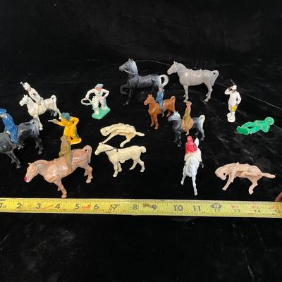 A COLLECTION OF TOY HORSES AND FIGURES