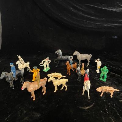 A COLLECTION OF TOY HORSES AND FIGURES