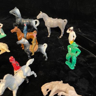 A COLLECTION OF TOY HORSES AND FIGURES