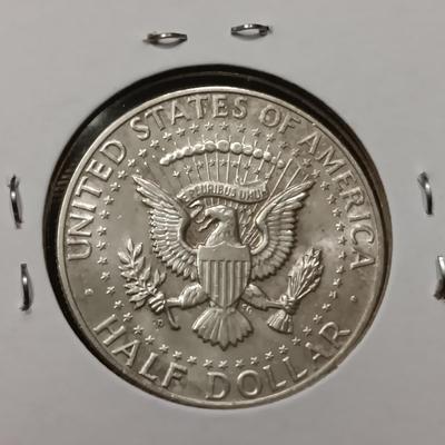 TWO 1964 SILVER KENNEDY HALF DOLLARS