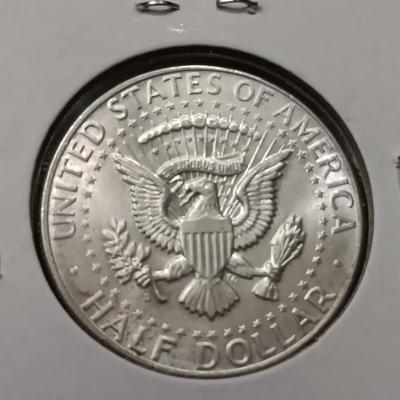 TWO 1964 SILVER KENNEDY HALF DOLLARS