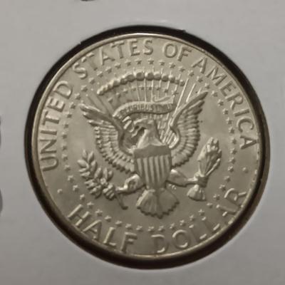 4 KENNEDY HALF DOLLARS