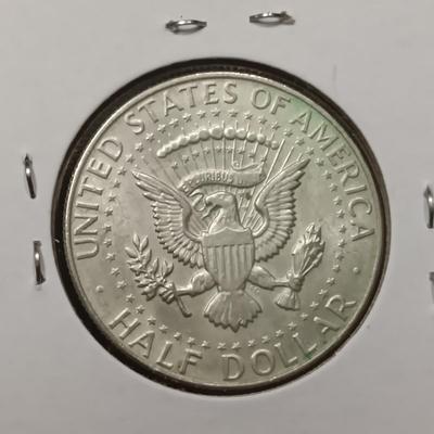 4 KENNEDY HALF DOLLARS