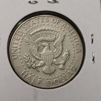 4 KENNEDY HALF DOLLARS