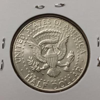 4 KENNEDY HALF DOLLARS