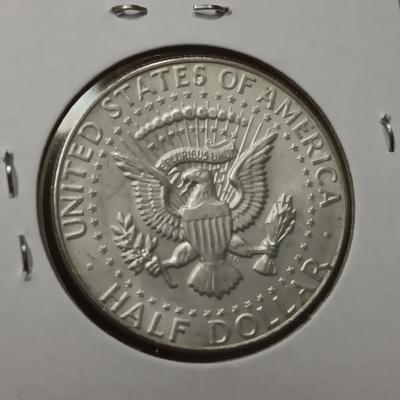 4 KENNEDY HALF DOLLARS