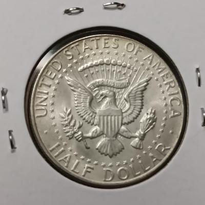 4 KENNEDY HALF DOLLARS