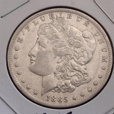 1885-O U. S. Morgan Silver Dollar Circulated (4)