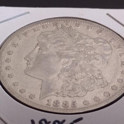 1885-O U. S. Morgan Silver Dollar Circulated (4)
