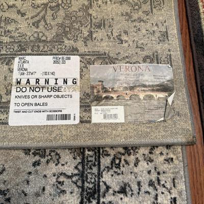 Two 4ft Area Rugs