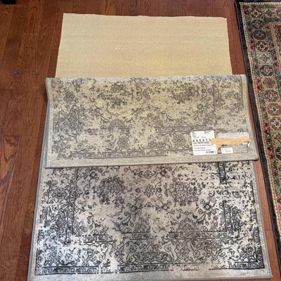 Two 4ft Area Rugs