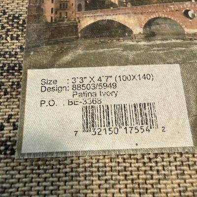 Two 4ft Area Rugs