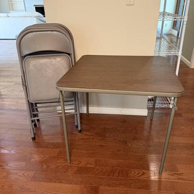 Samsonite Card Table with Four Cushioned Folding Chairs