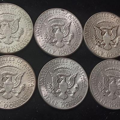 EIGHT 1964 KENNEDY SILVER HALF DOLLARS