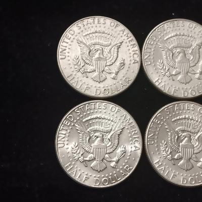 EIGHT 1964 KENNEDY SILVER HALF DOLLARS