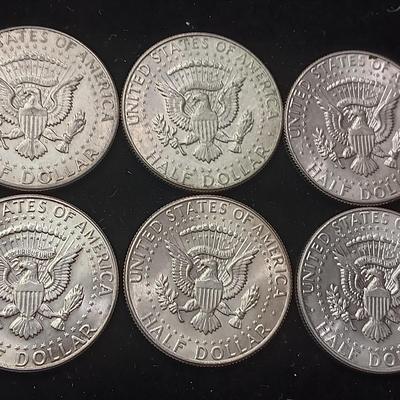 EIGHT 1964 KENNEDY SILVER HALF DOLLARS