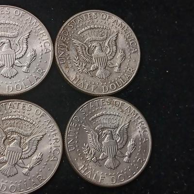EIGHT 1964 KENNEDY SILVER HALF DOLLARS
