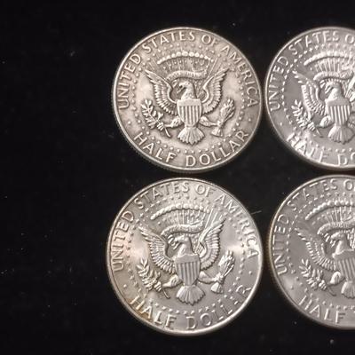 EIGHT 1964 KENNEDY SILVER HALF DOLLARS