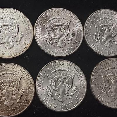EIGHT 1964 KENNEDY SILVER HALF DOLLARS