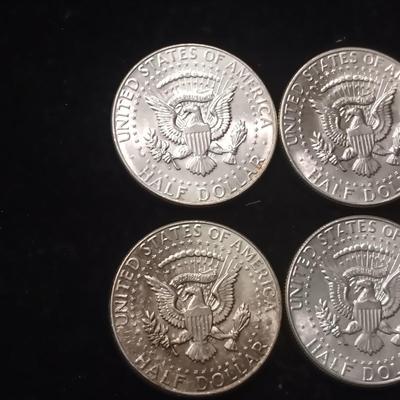 EIGHT 1964 KENNEDY SILVER HALF DOLLARS
